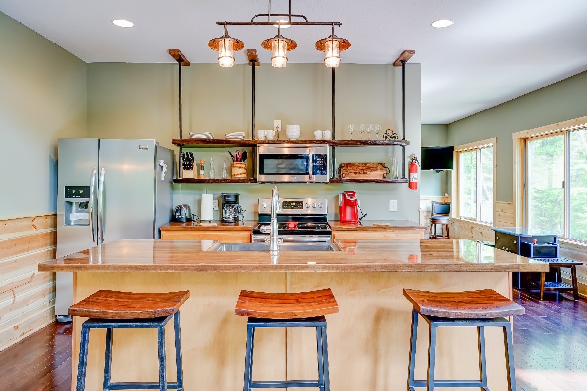 Photo 2087_3932.jpg - Modern kitchen amenities with rustic charm.