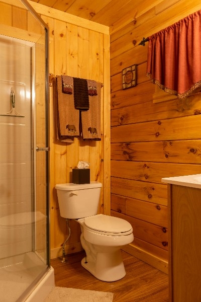 Photo 1407_5159.jpg - The bathroom includes a corner shower area.