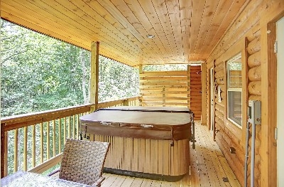 Photo 2032_4893.jpg - Private back deck with hot tub, seasonal outdoor shower and seating