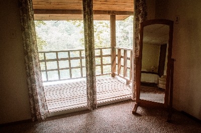 Photo 21_5050.jpg - View of Bedroom in Mirror with view of porch. Deck overlooks lake. 