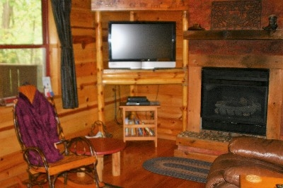 Photo 306_4328.jpg - Enjoy the flat screen TV with a large gas log fireplace. 